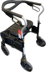 Black folding rollator walker with seat, backrest, and four wheels on white background