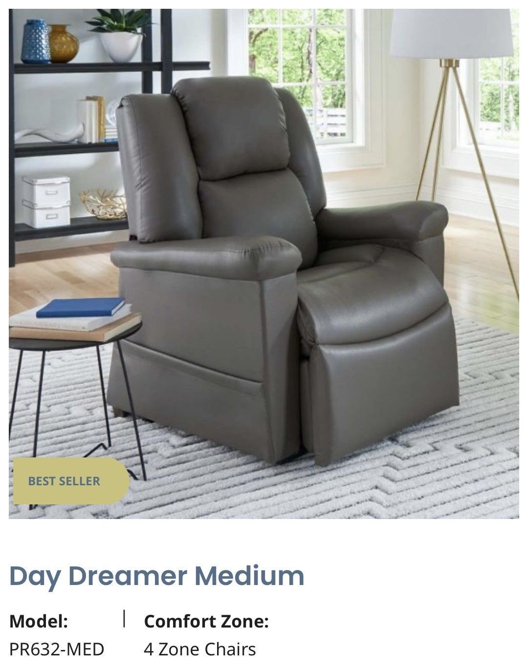 Gray power recliner chair in a bright living room beside a side table and lamp
