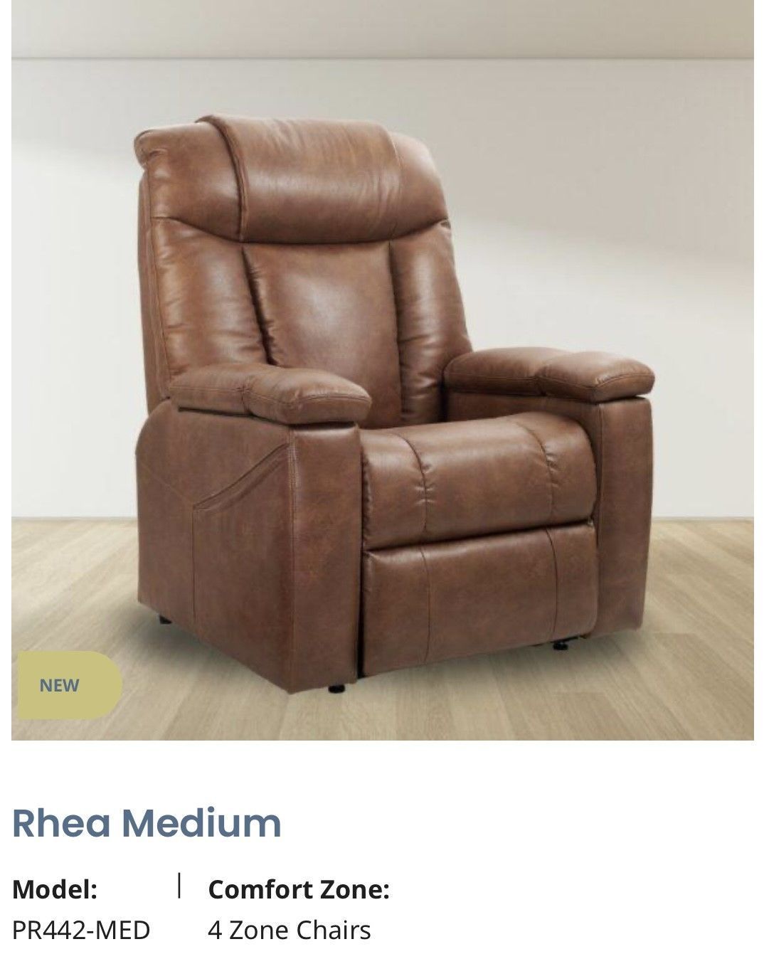 Brown leather recliner chair with padded arms and back on a light wood floor.