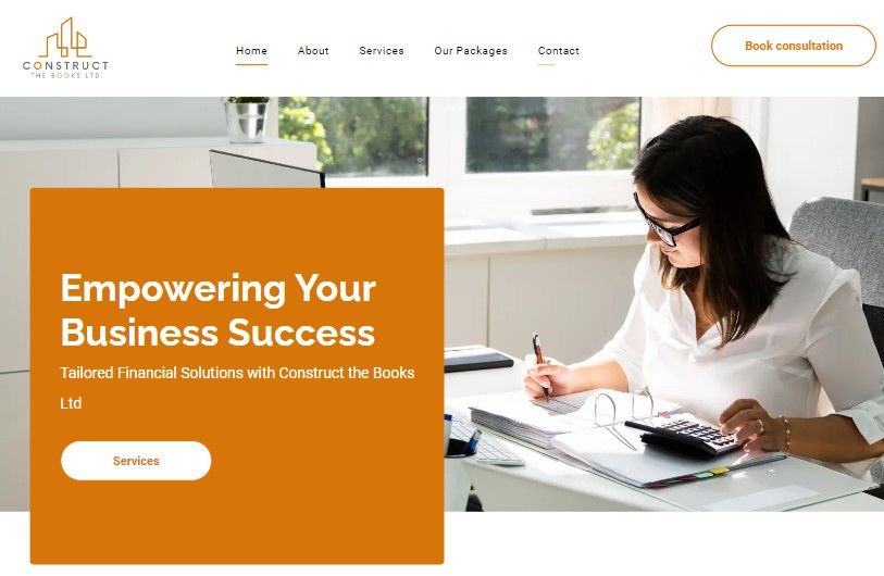 Website hero banner with orange text panel and a woman writing at a desk beside a laptop