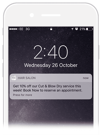IPhone lock screen showing a Hair Salon promo notification about a cut and blow-dry discount