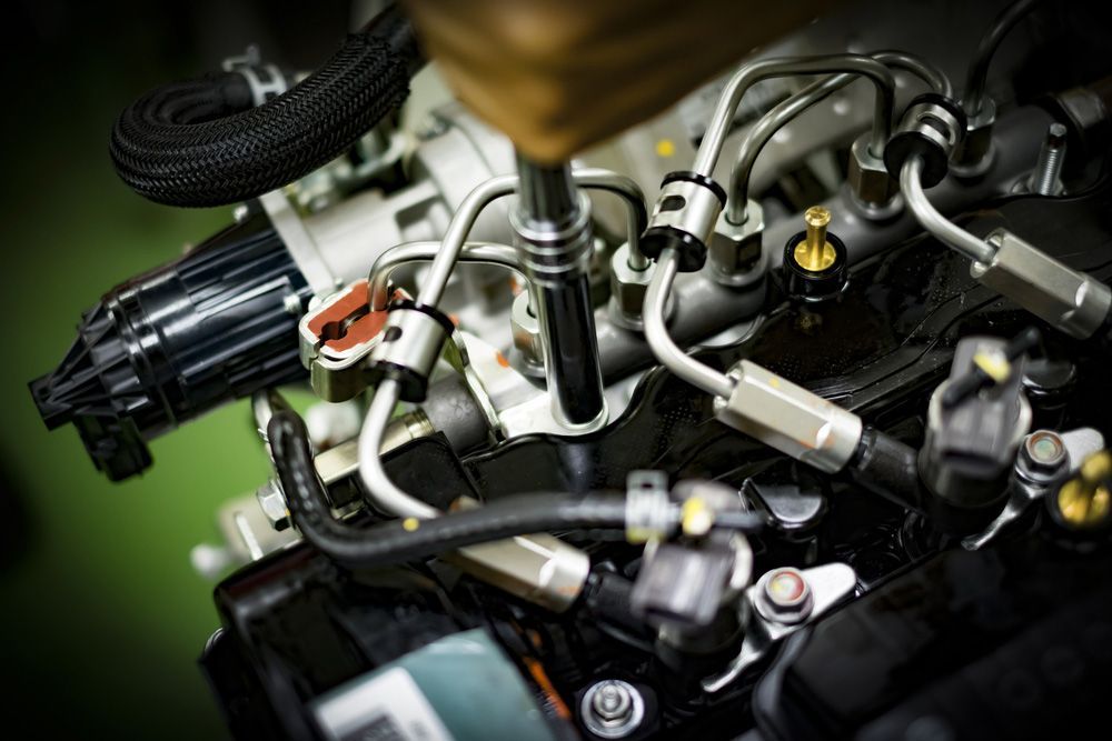 A Close Up Of A Car Engine With A Lot Of Wires Coming Out Of It — Fase Automotive In Sunset, QLD