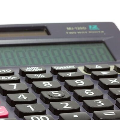 A Close Up Of A Calculator With The Number 12 On The Screen - Individual & Business Taxation & Financial Planning in Mackay