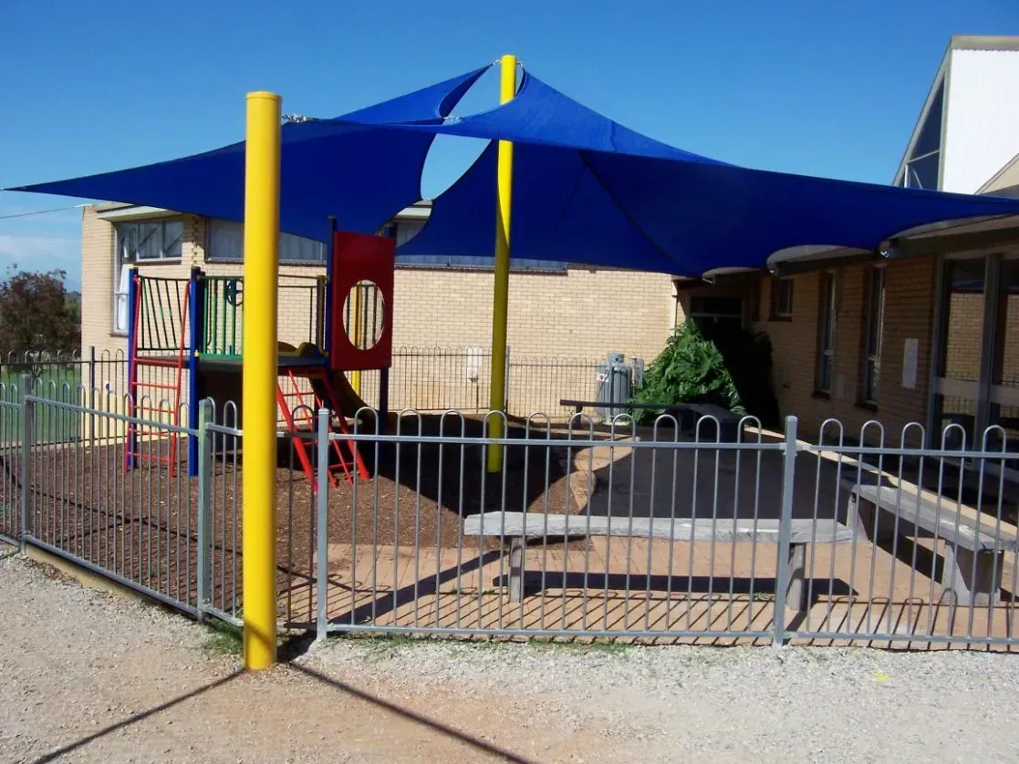 Playground With Blue Shade Sail, Yellow Poles — The Gazebo and Shade Centre in Jindera, NSW