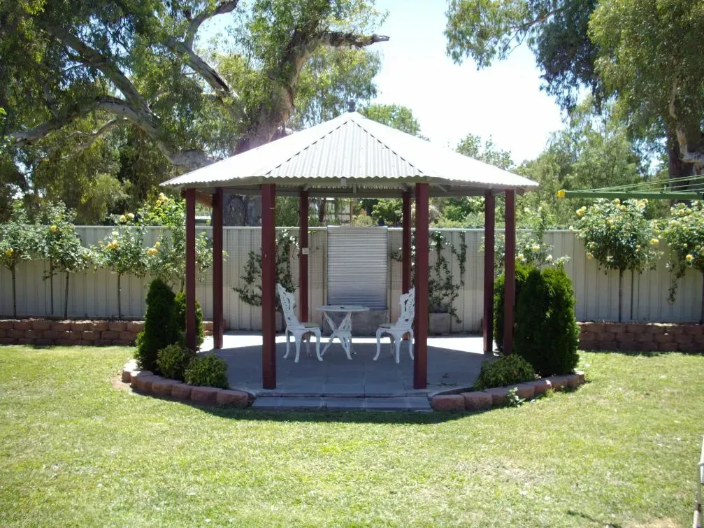 Gazebo in a Backyard With Chairs, a Table — The Gazebo and Shade Centre in Jindera, NSW