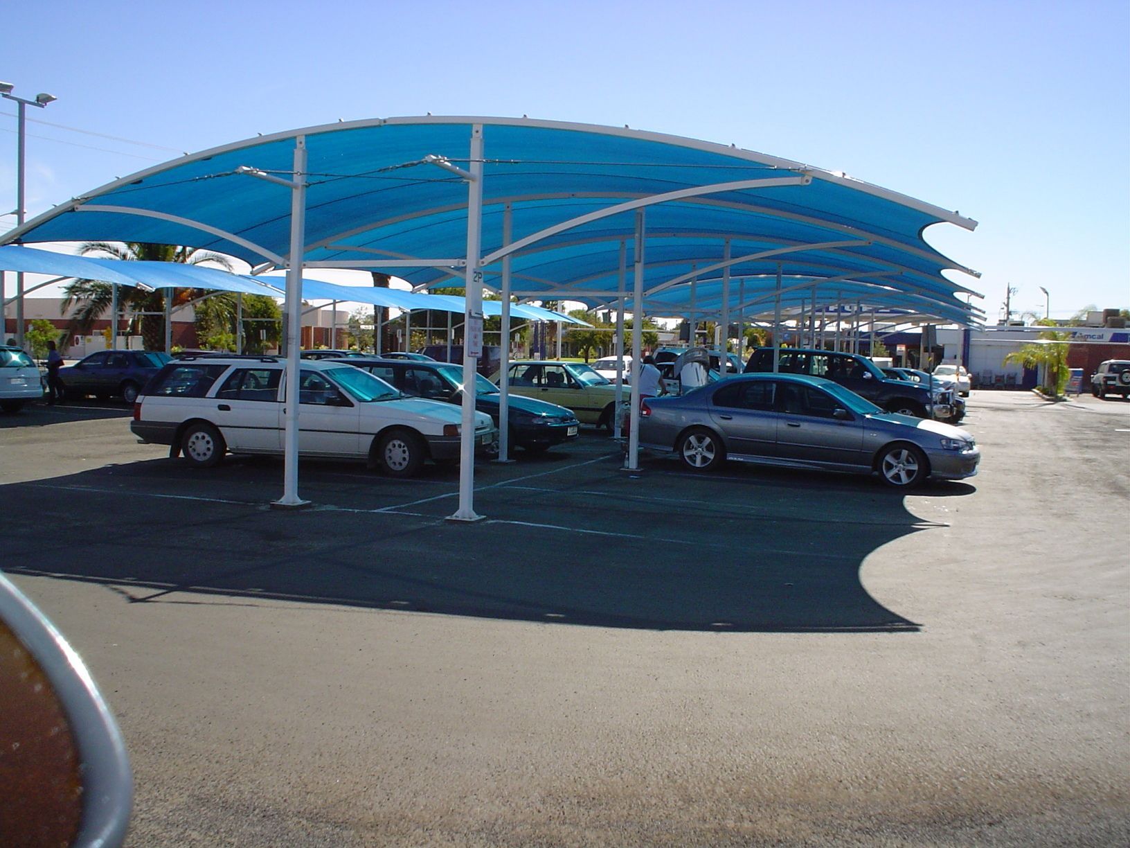 Cars Parked in an Outdoor Lot Under a Large — The Gazebo and Shade Centre in Jindera, NSW