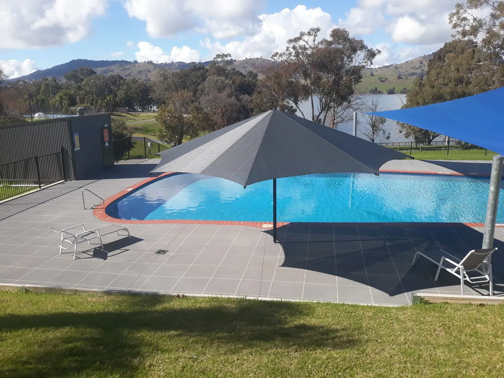 Pool With Shaded Areas and Lounge Chairs — The Gazebo and Shade Centre in Jindera, NSW