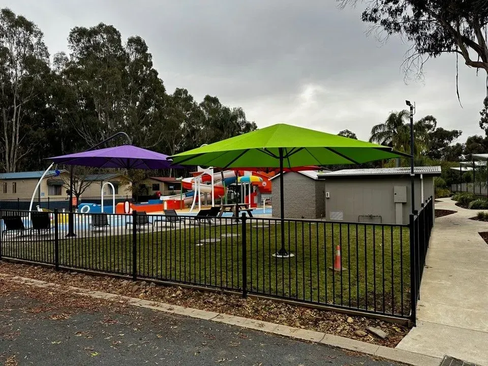 Pool Area With a Water Slide — The Gazebo and Shade Centre in Jindera, NSW