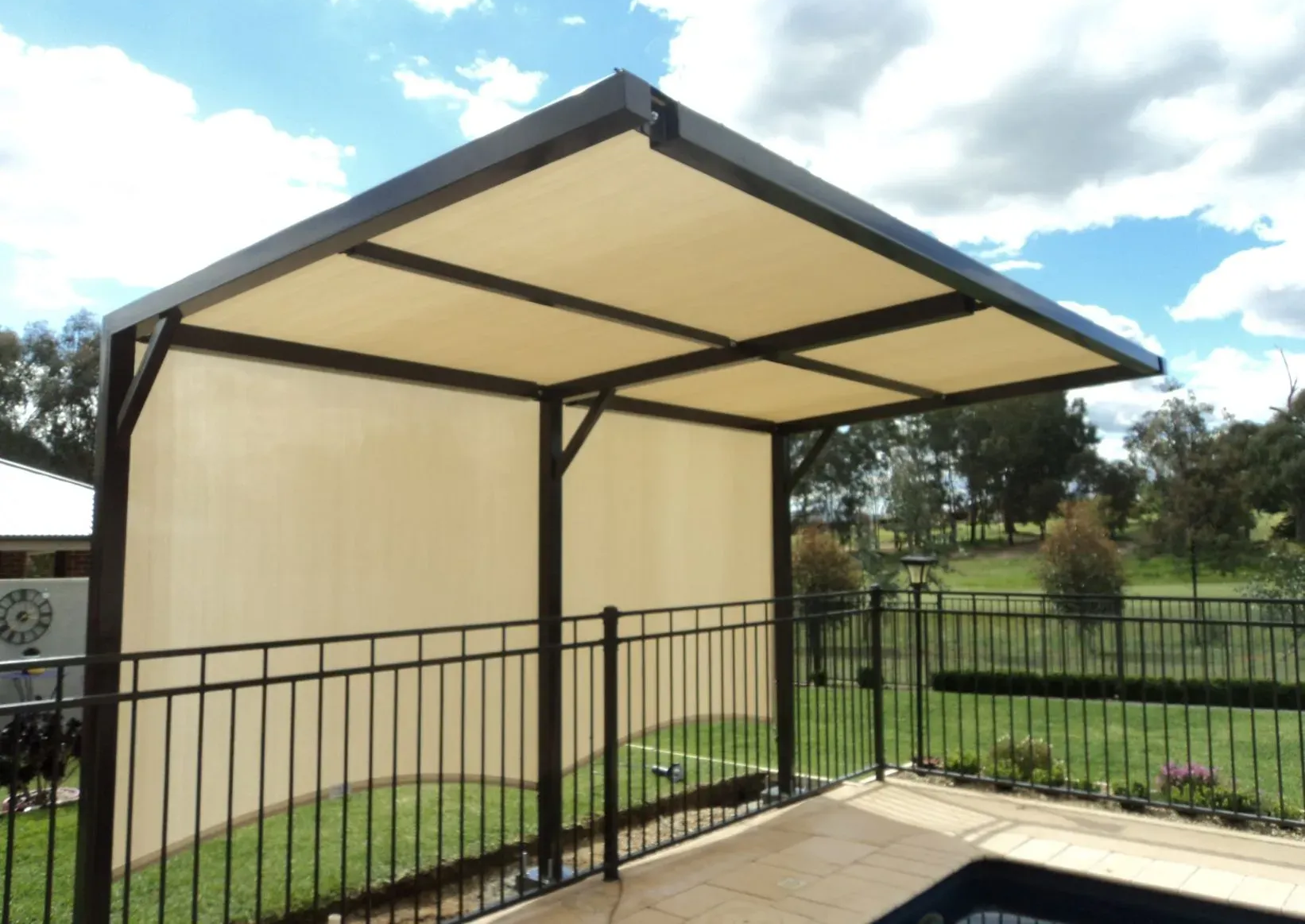 Beige Canopy Provides Shade Over a Patio Area — The Gazebo and Shade Centre in Jindera, NSW