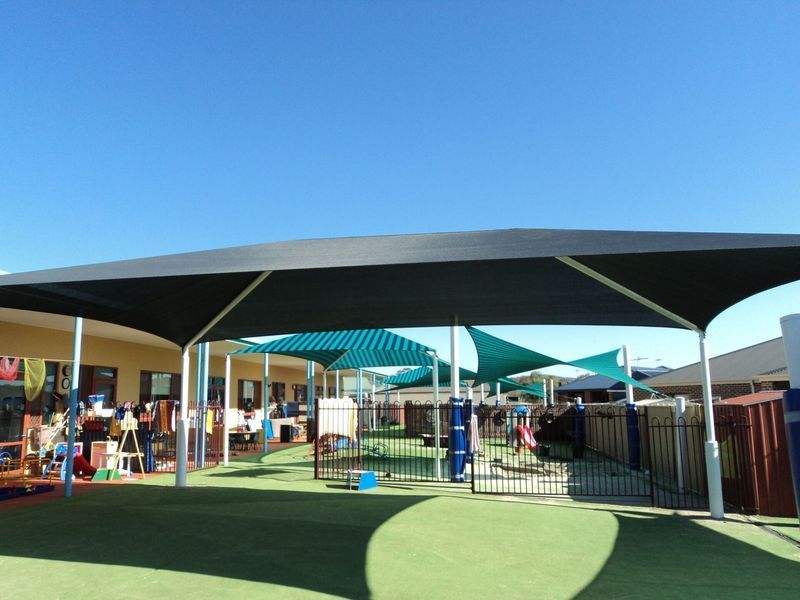 Playground With Multiple Shade Sails Over Artificial Turf — The Gazebo and Shade Centre in Wangaratta, VIC
