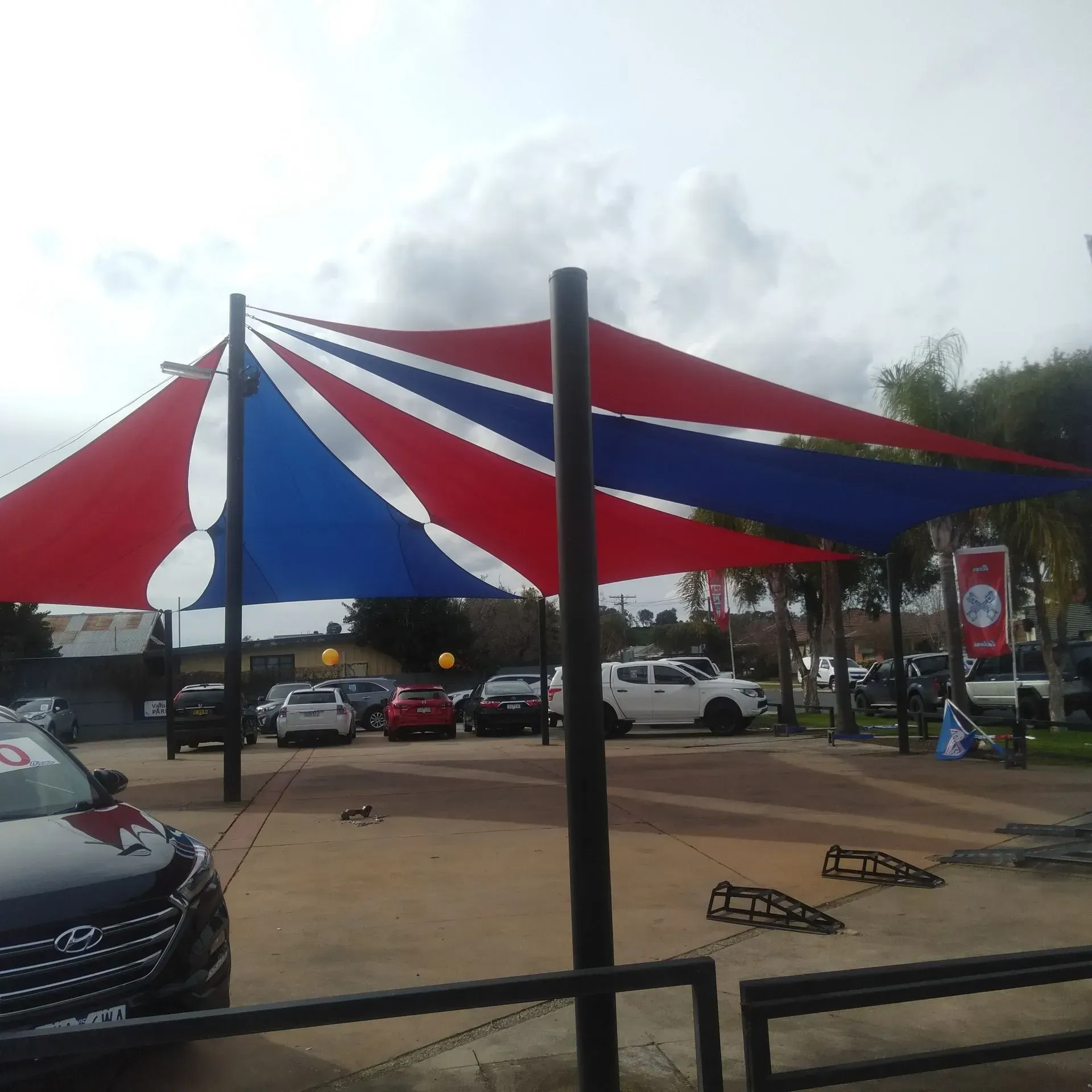 Car Dealership Lot With a Red — The Gazebo and Shade Centre in Jindera, NSW