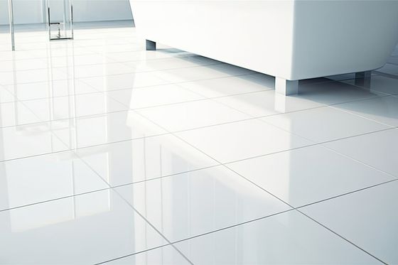 A white tiled floor with a couch in the background