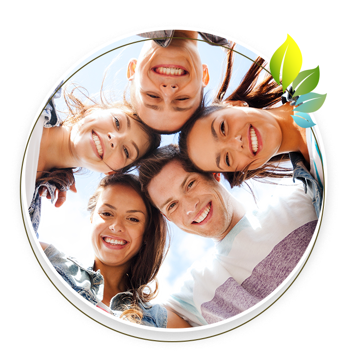 a group of people are standing in a circle and smiling