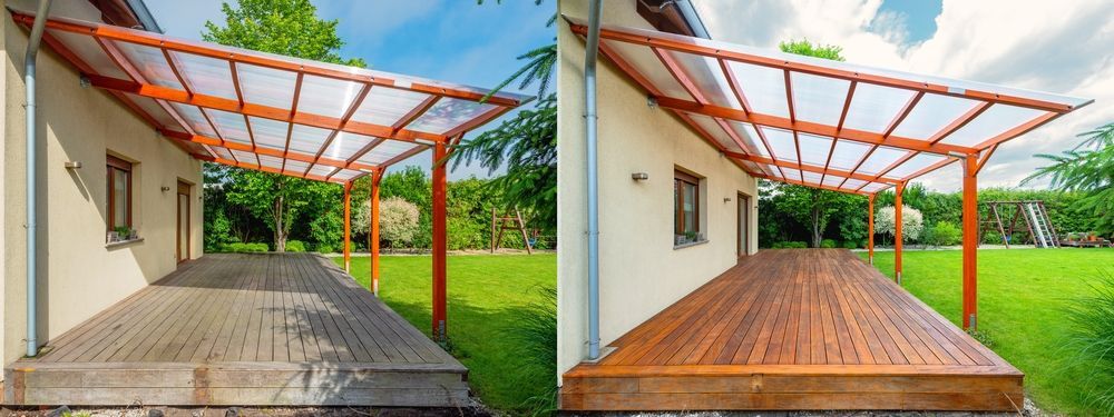 Side-by-side patio deck before and after staining, changing from gray to warm wood brown under a roofed pergola