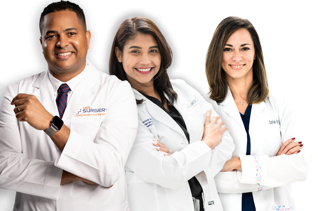 A group of doctors standing next to each other with their arms crossed.