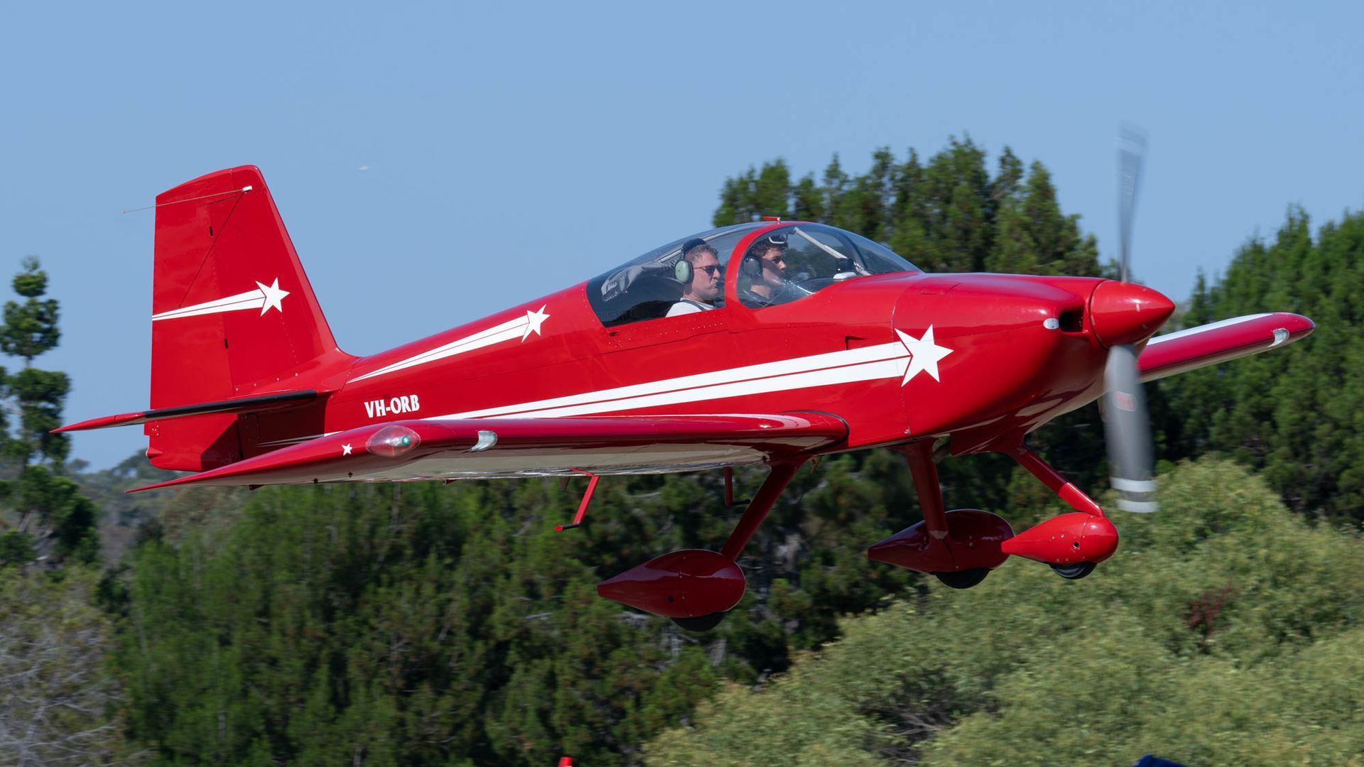 A red plane with the letters pvm on the tail