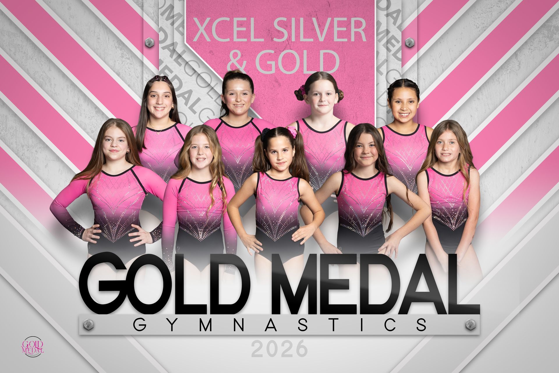 Three gymnasts in black and pink leotards hold hands on a blue mat, smiling.