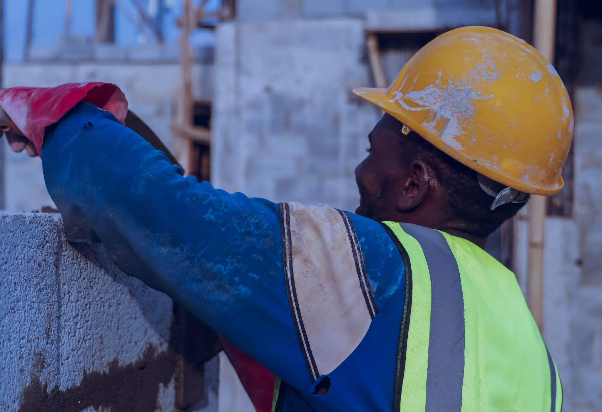 Person building a wall