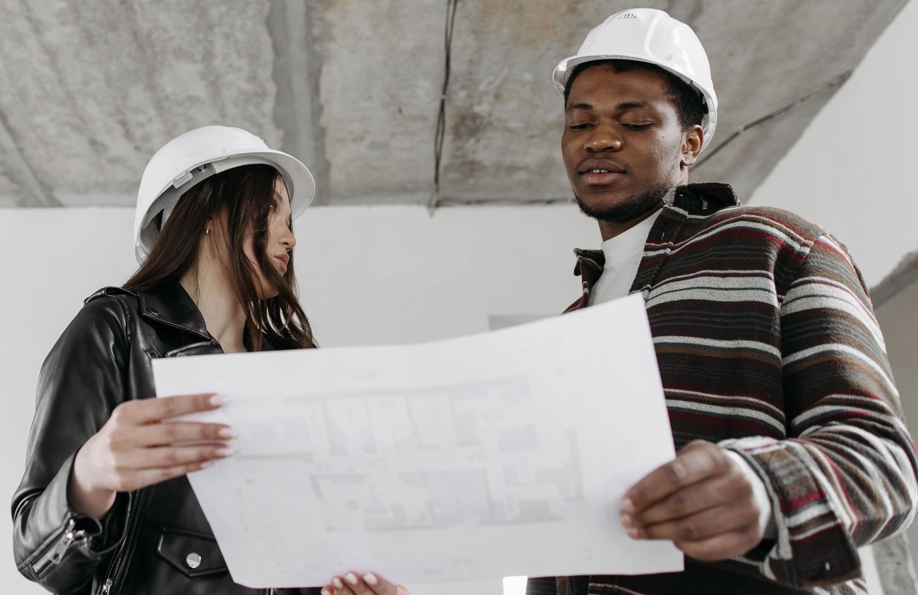 structural engineers looking at a drawing