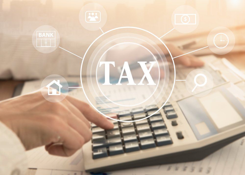 Women Using Calculator — Accountants & Bookkeepers in Southern Highlands