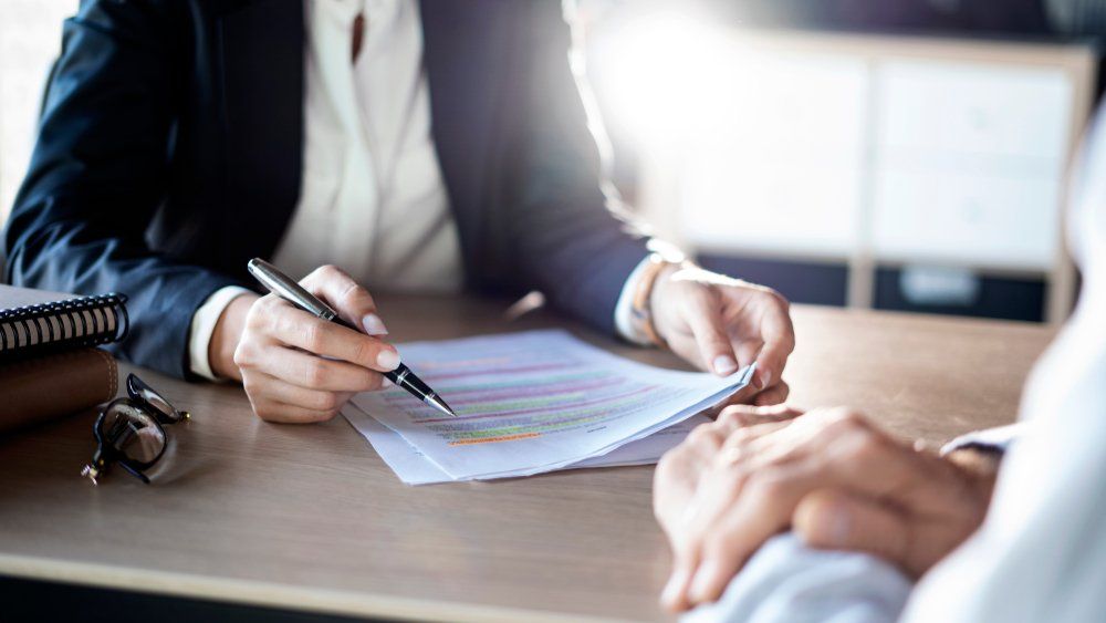 Accountant Going Through Tax Return — Accountants & Bookkeepers in Southern Highlands