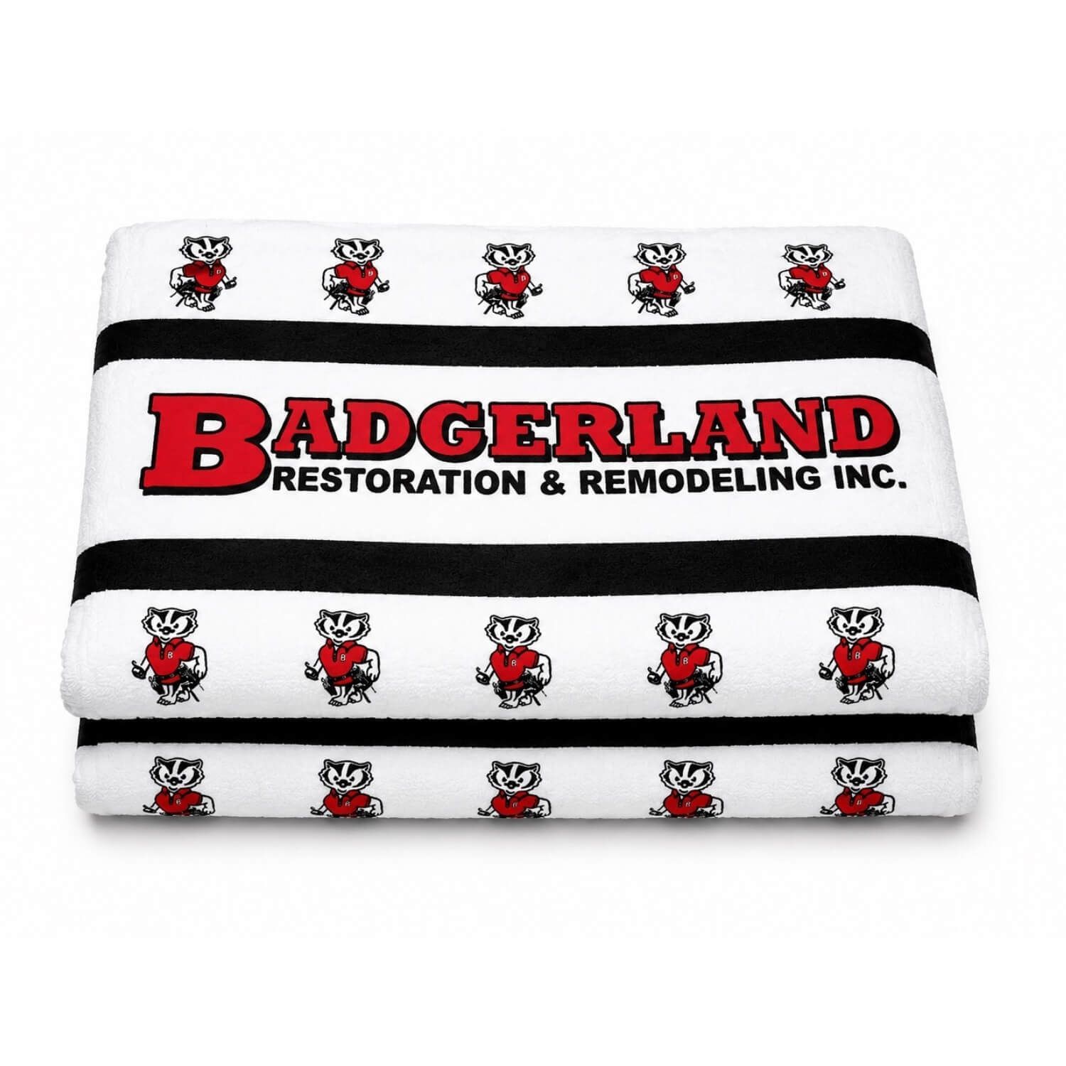 2 folded beach towels with Badgerland Restoration & Remodeling logo