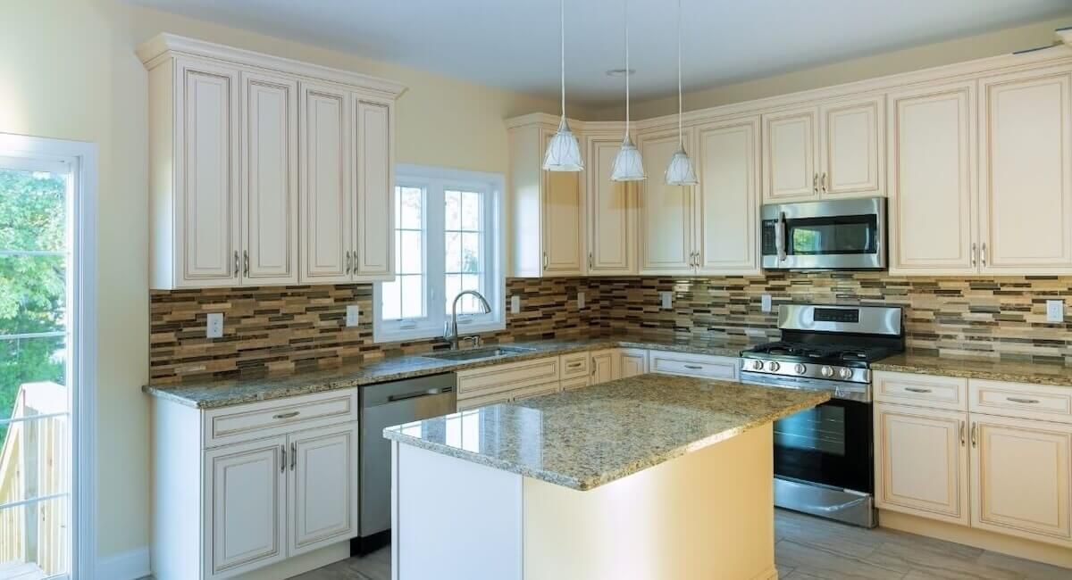 Newly remodeled kitchen in Waupaca WI with white kitchen cabinets | Badgerland Restoration & Remodeling Weyauwega Wisconsin