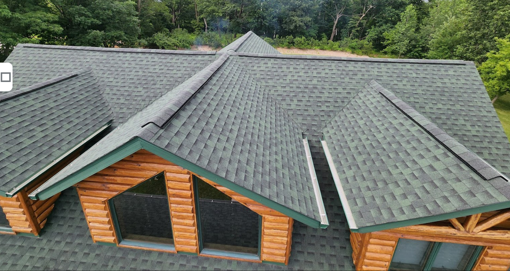 Badgerland Restoration & Remodeling replaced home's hail damaged roof in New London WI GAF Timberline HDZ Hunter Green