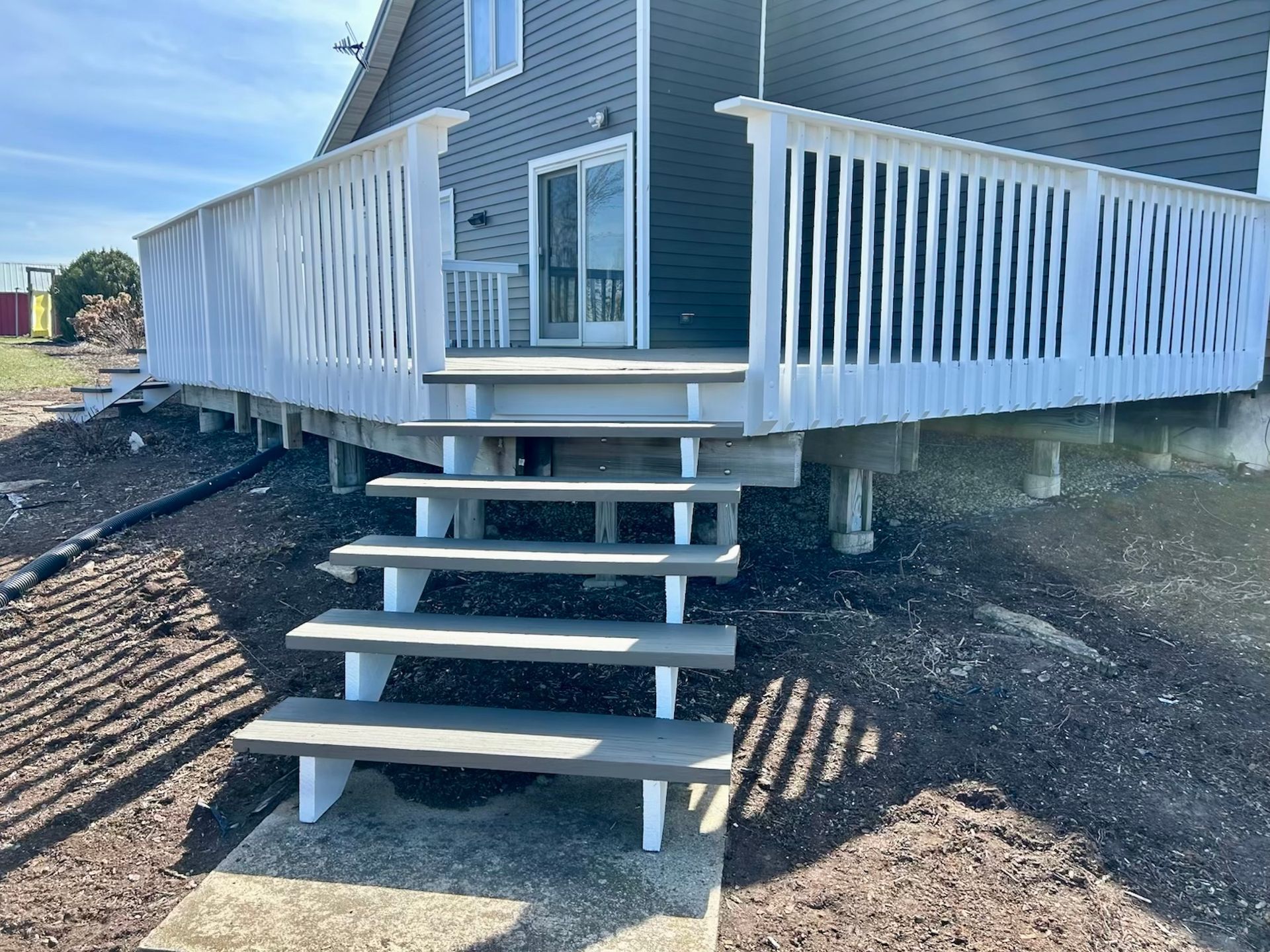 Renew Plastics white composite deck replacement Chain O’ Lakes in Waupaca WI Badgerland Restoration & Remodeling Contractor