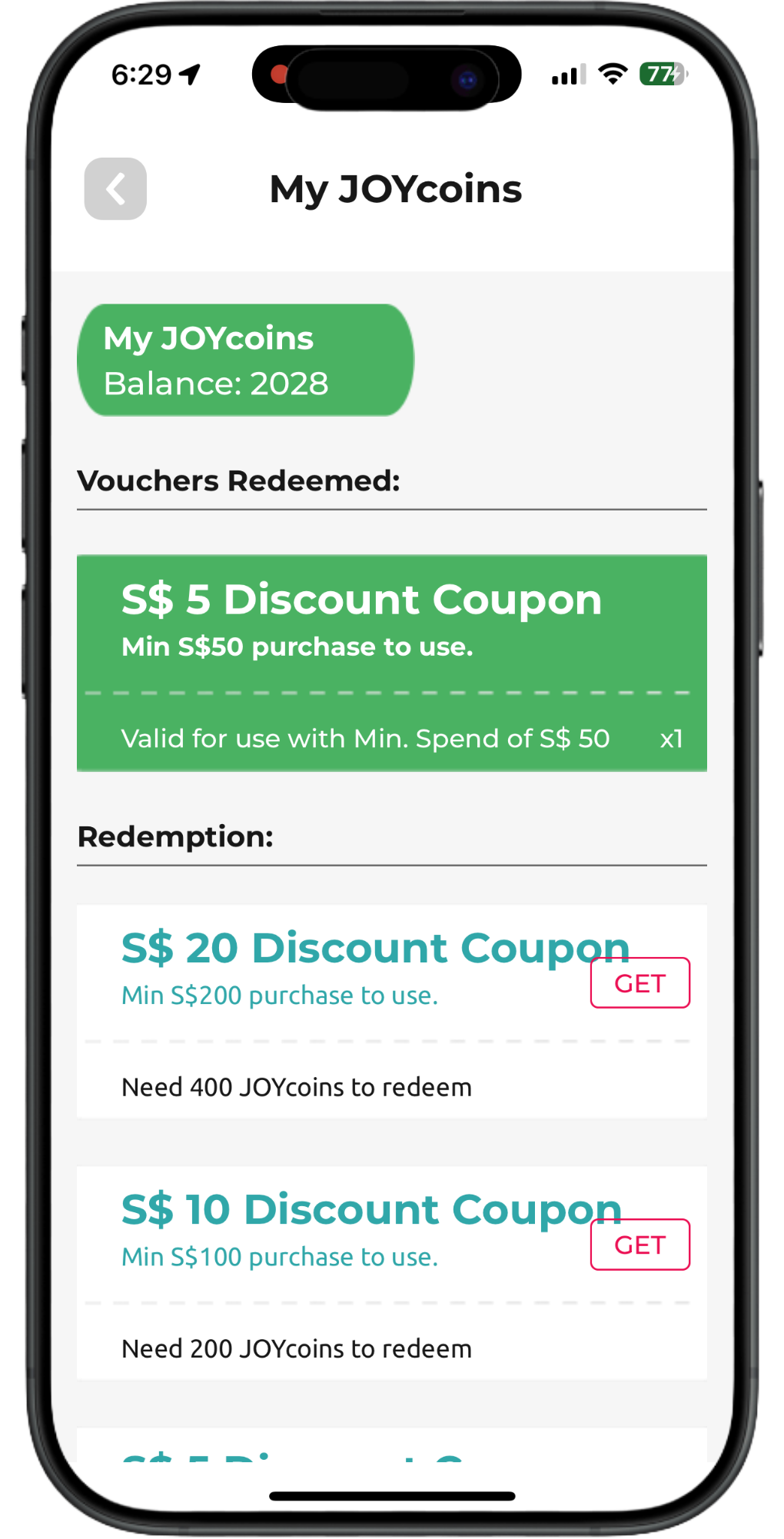 Mobile app screen showing “My 10VCCoins” voucher redemption list with green and white coupon cards.
