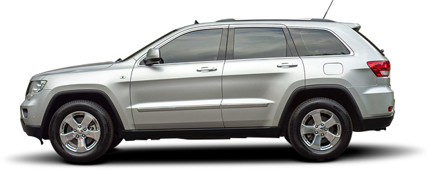 A silver Jeep Grand Cherokee SUV viewed from the side against a white background. | Airpark Auto Pros
