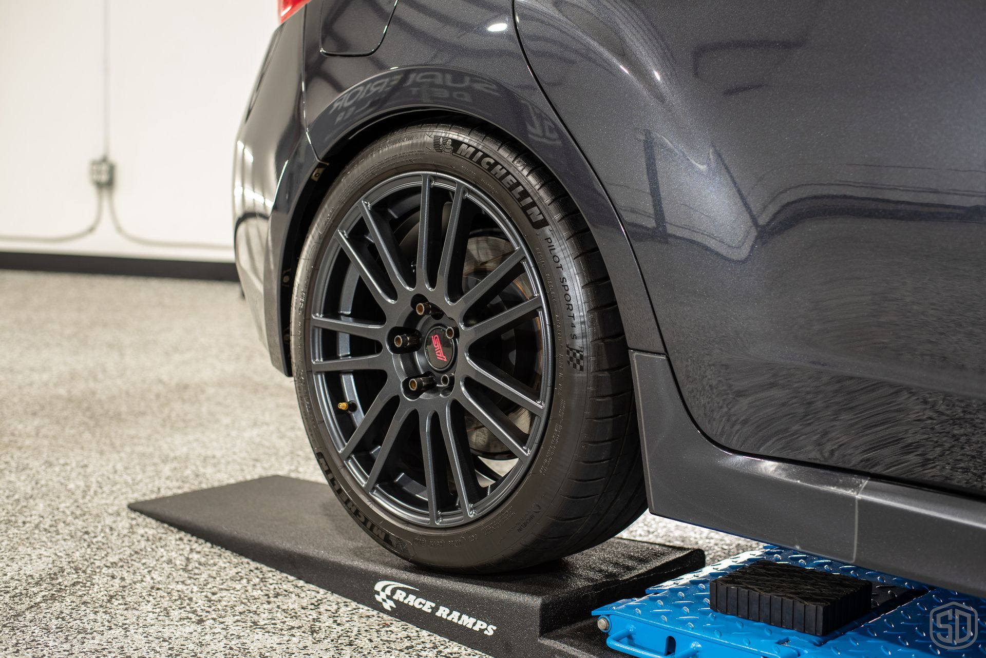 2010 Subaru WRX STI Signature Suspension Detail - wheels, suspension, and brake calipers wheel close upFlorida