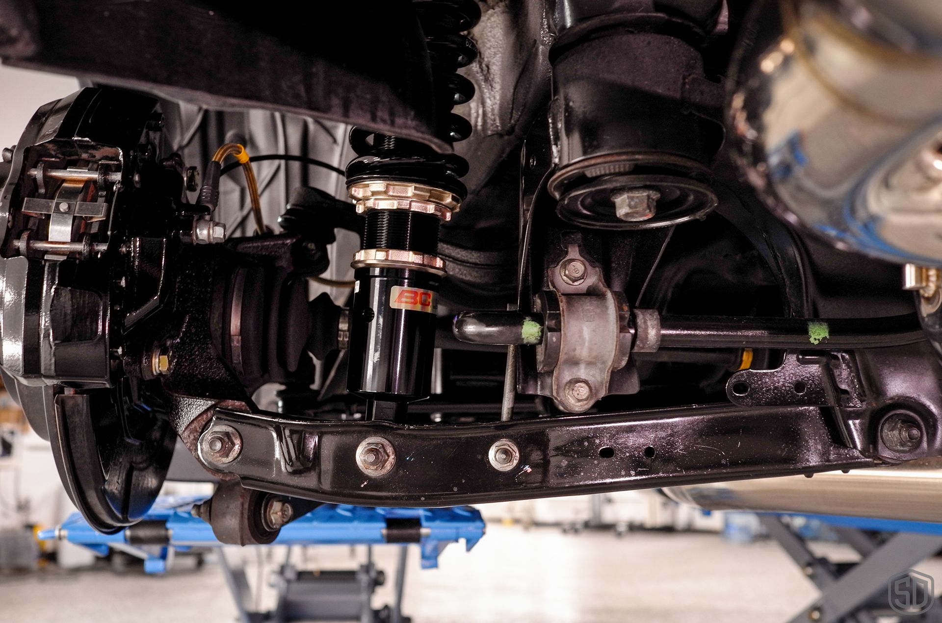2010 Subaru WRX STI Signature Suspension Detail - wheels, suspension, and brake calipers suspension close up Orlando FL
