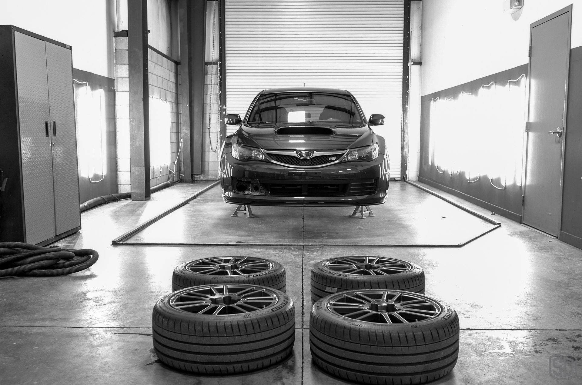 2010 Subaru WRX STI Signature Suspension Detail - wheels, suspension, and brake calipers Orlando