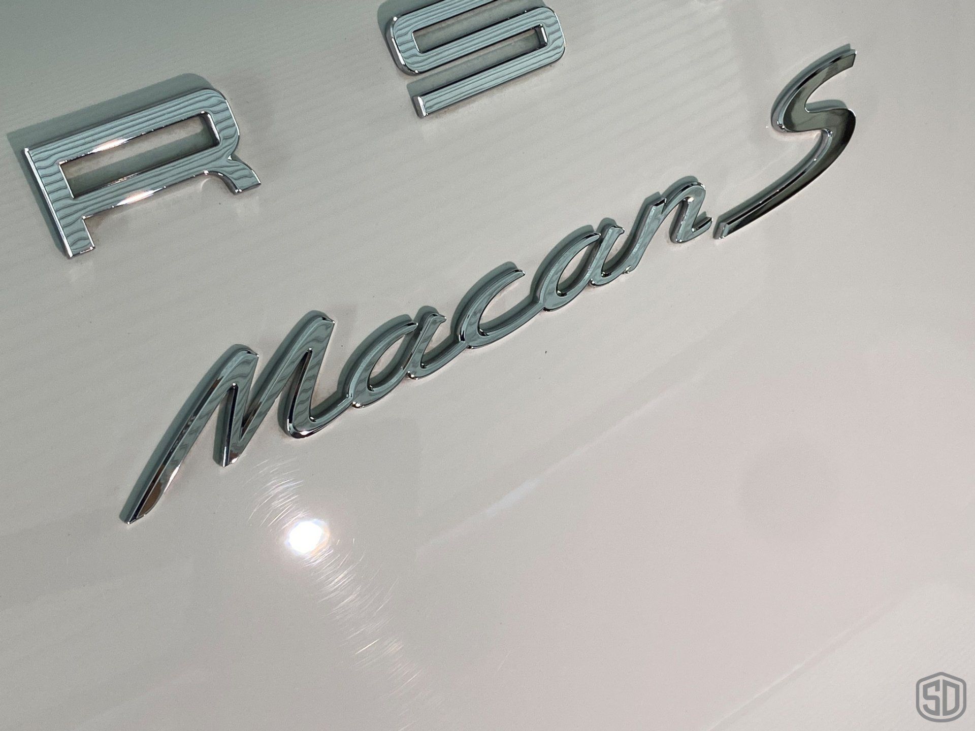 2019 Porsche Macan high end detailing Modesta BC-06 water repellent glass coating rear emblem close up Orlando Florida