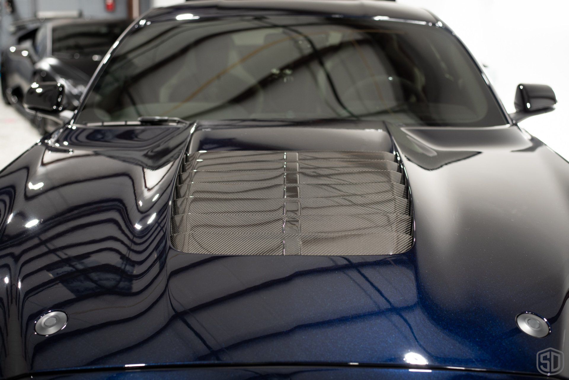 2021 Mustang GT500 Carbon Revolution wheels polished and then coated Modesta BC-06. We wrapped the new carbon fiber hood vents and rear wing with Xpel Paint protection film after Orlando