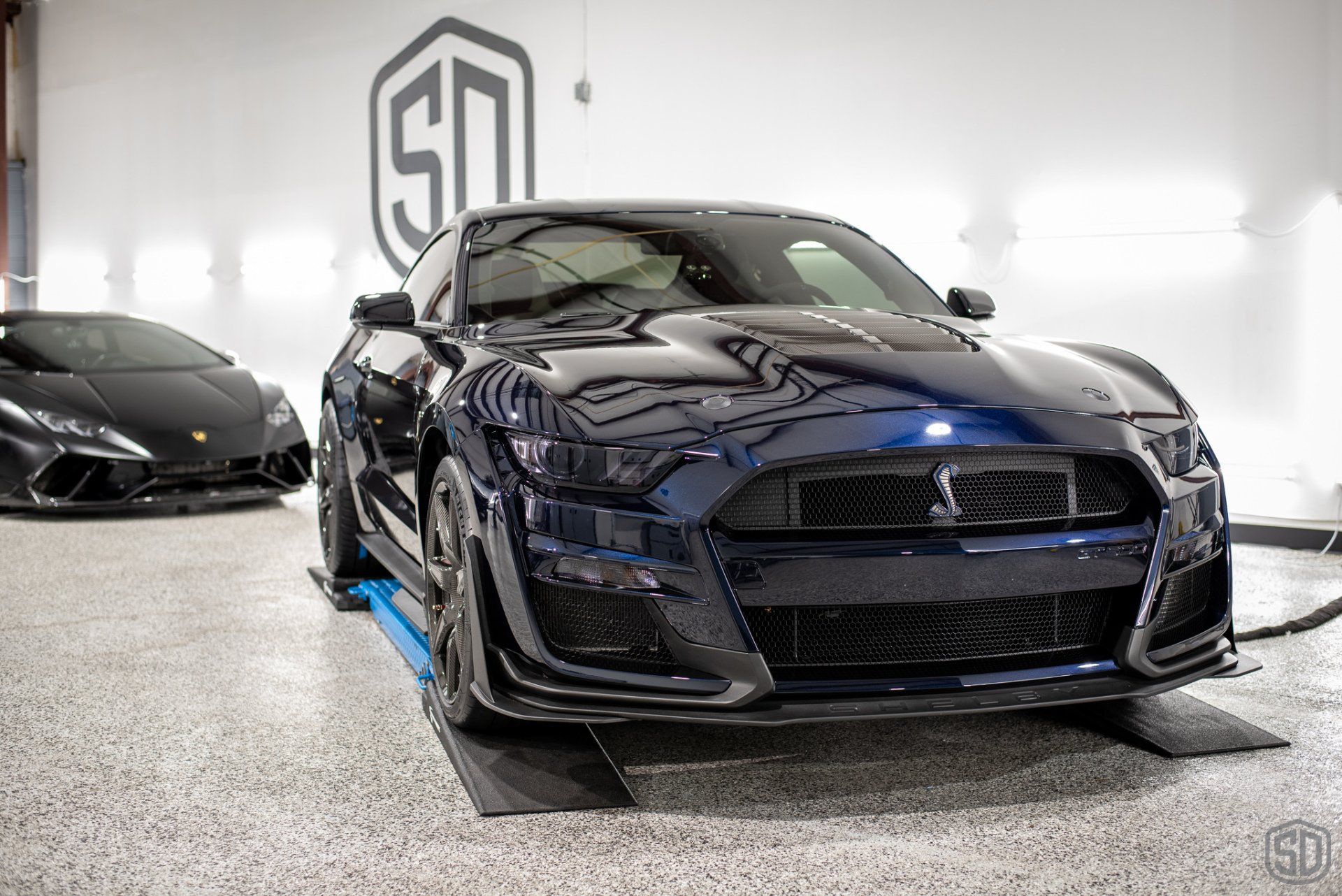 2021 Mustang GT500 Carbon Revolution wheels polished and then coated Modesta BC-06. We wrapped the new carbon fiber hood vents and rear wing with Xpel Paint protection film Orlando FL