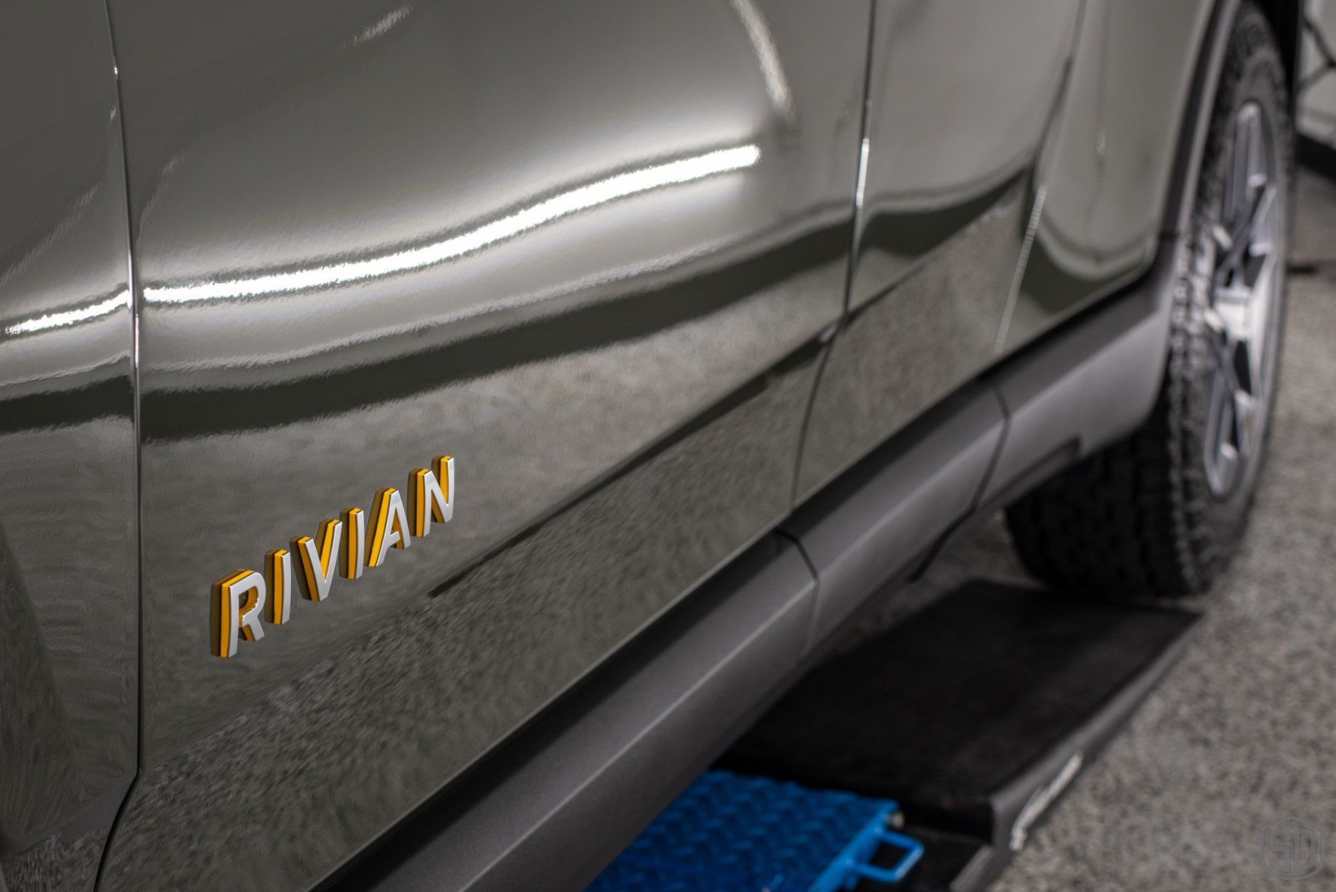 2022 Rivian R1T Preparation Wash, Emblem Removal, Level 2 Paint Correction, Paint Protection Film, Modesta BC-08 Ceramic Coating emblem close up detailOrlando