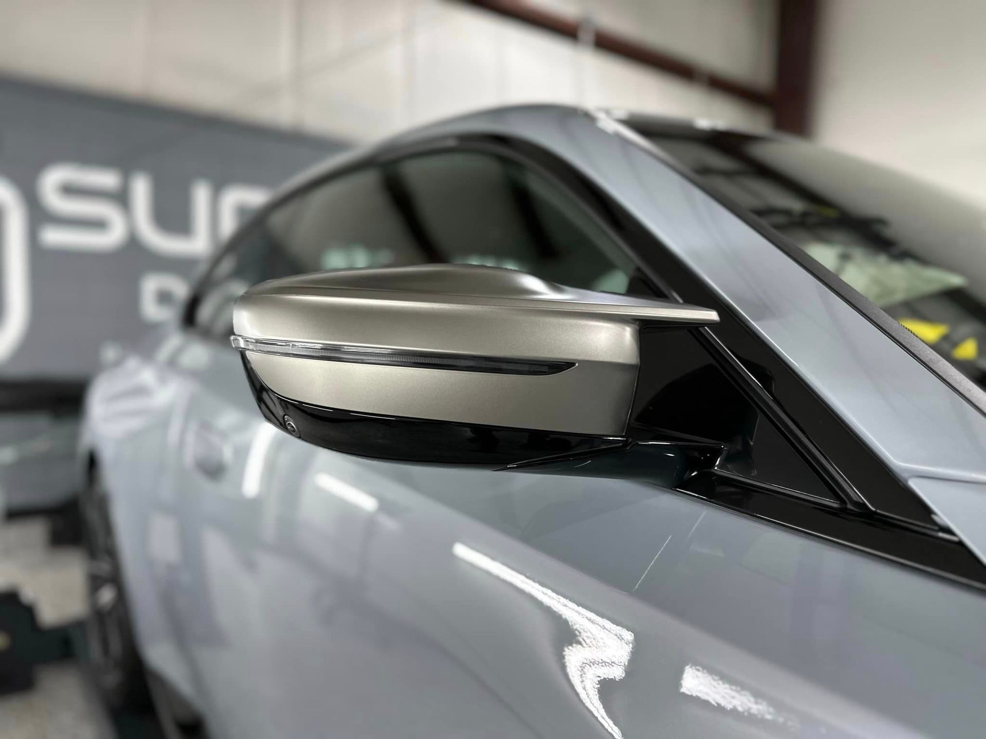 2023 BMW M240I Front Bumper, Hood, Headlights and Mirror Wrap Paint Protection Film mirror close up Orlando USA