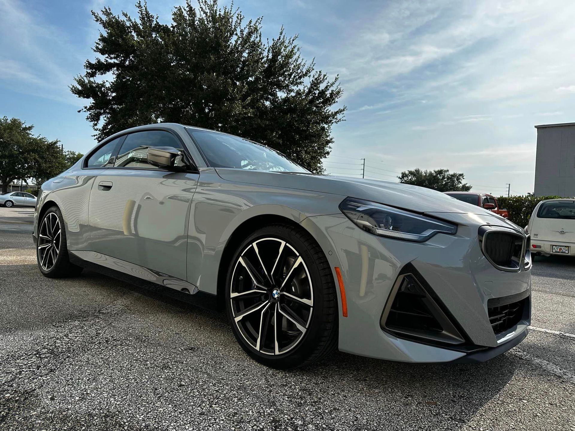 2023 BMW M240I Front Bumper, Hood, Headlights and Mirror Wrap Paint Protection Film side view Florida