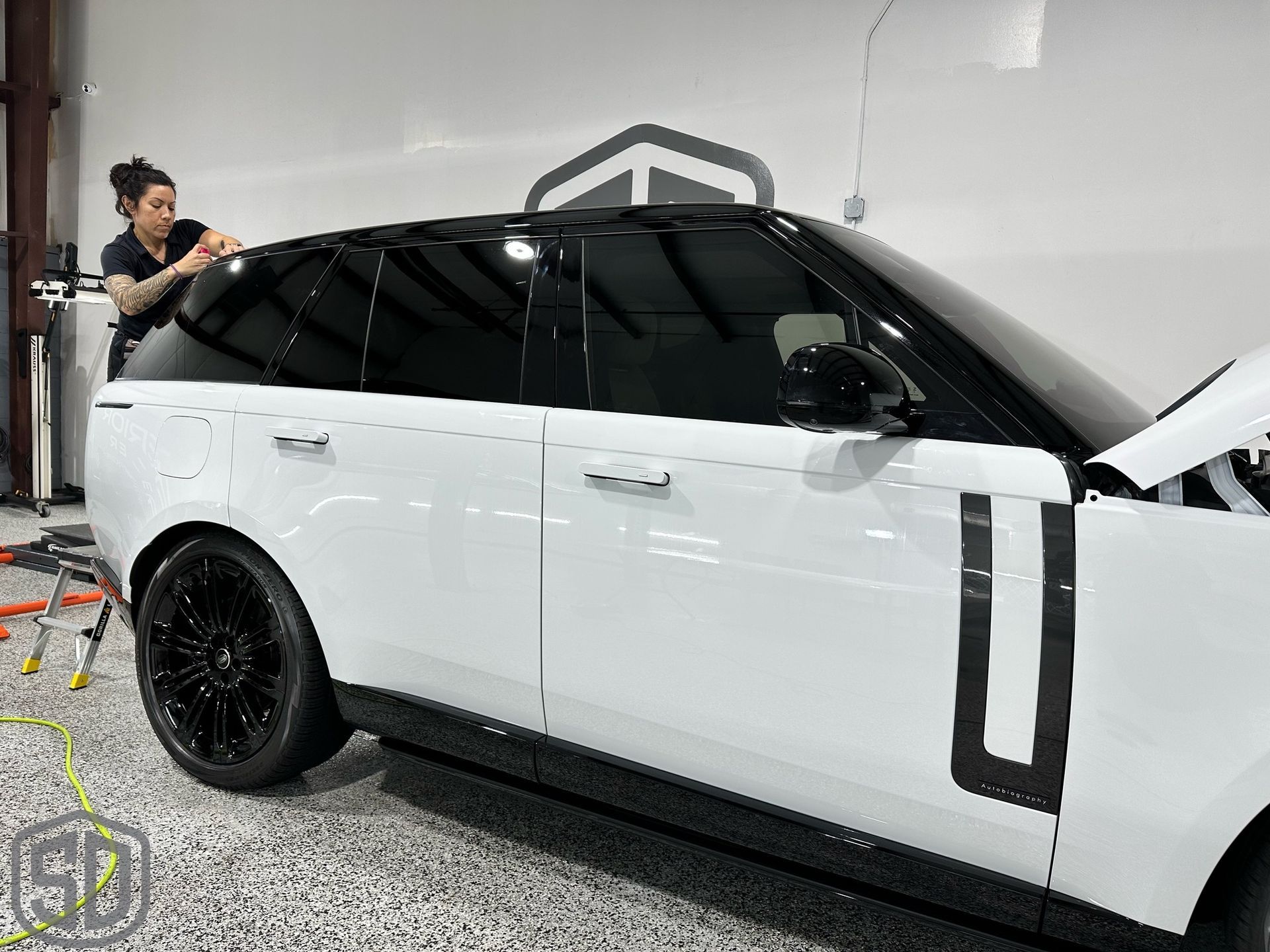 2023 Land Rover Range Rover Autobiography Detailing, Suntek Paint Protection Film, Ceramic Window Film, Modesta BC-06 Top Coat, Exterior Glass Coating, and BC-04 Nano-Titanium Coating side panel view Orlando, Florida USA