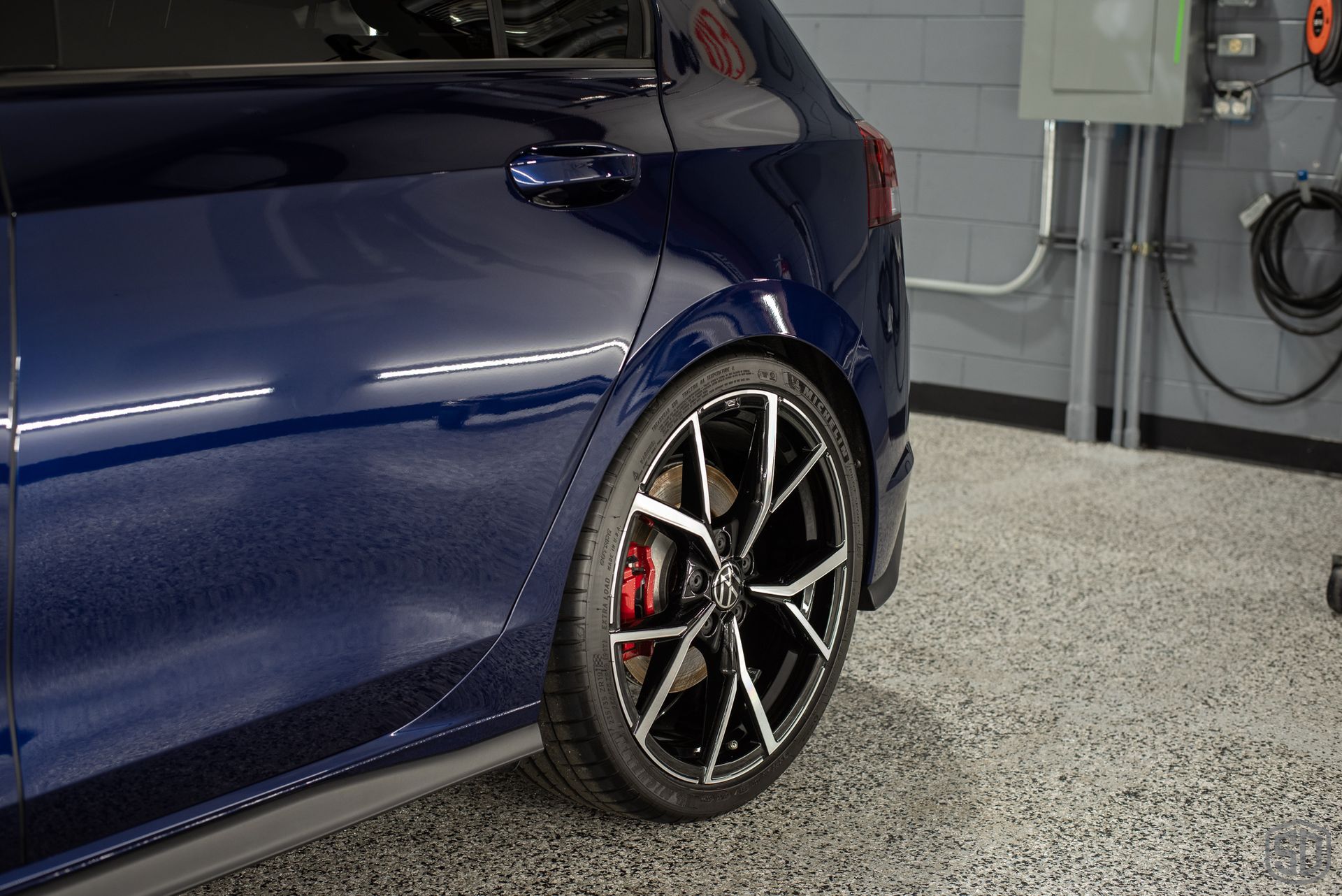 2023 VW GTI Paint Correction and Modesta Coatings rear wheel close up Orlando FL