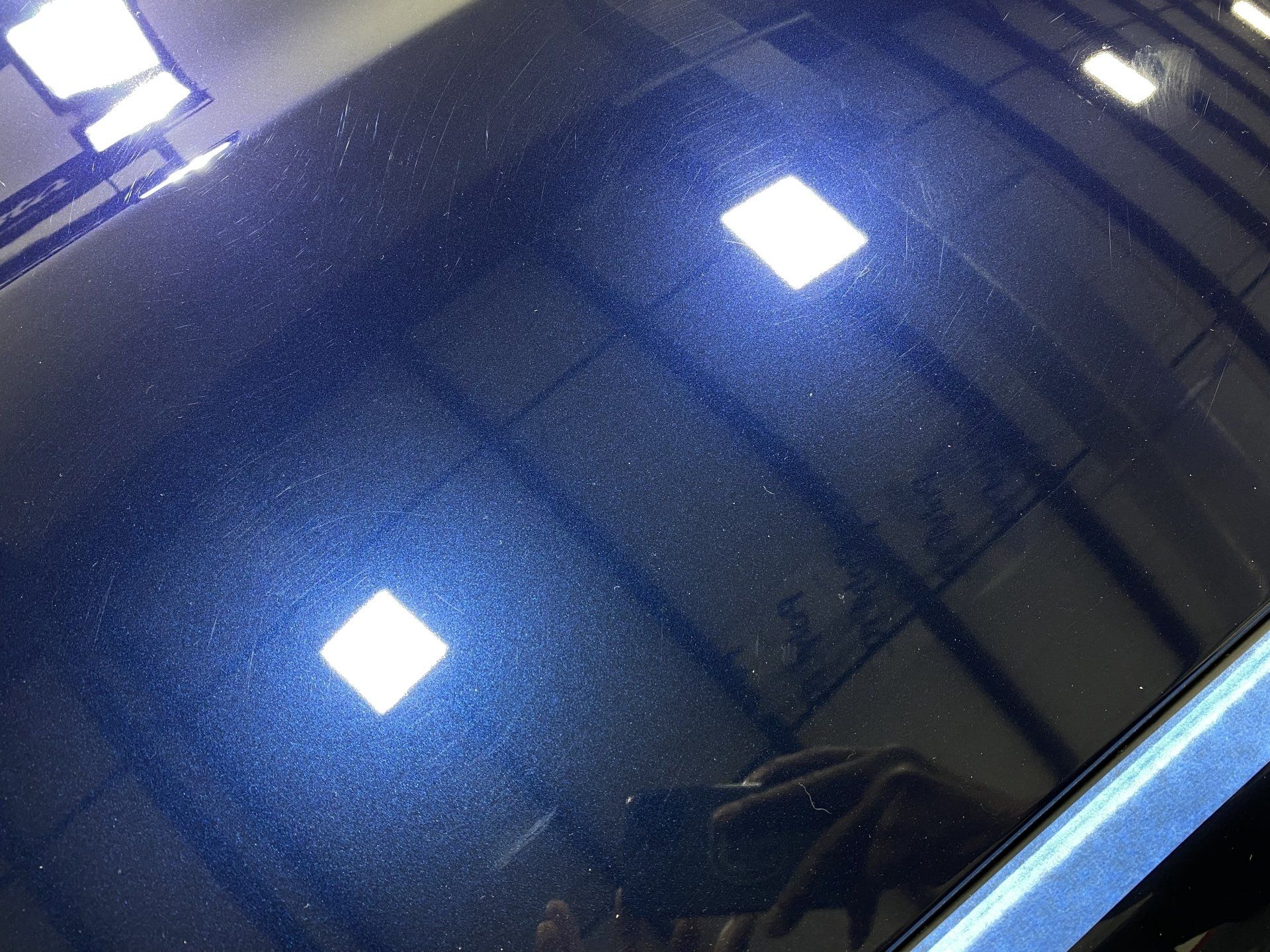 A close up of a car 's roof with two square lights on it