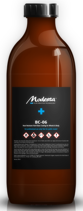 A brown bottle with a black label that says moderate
