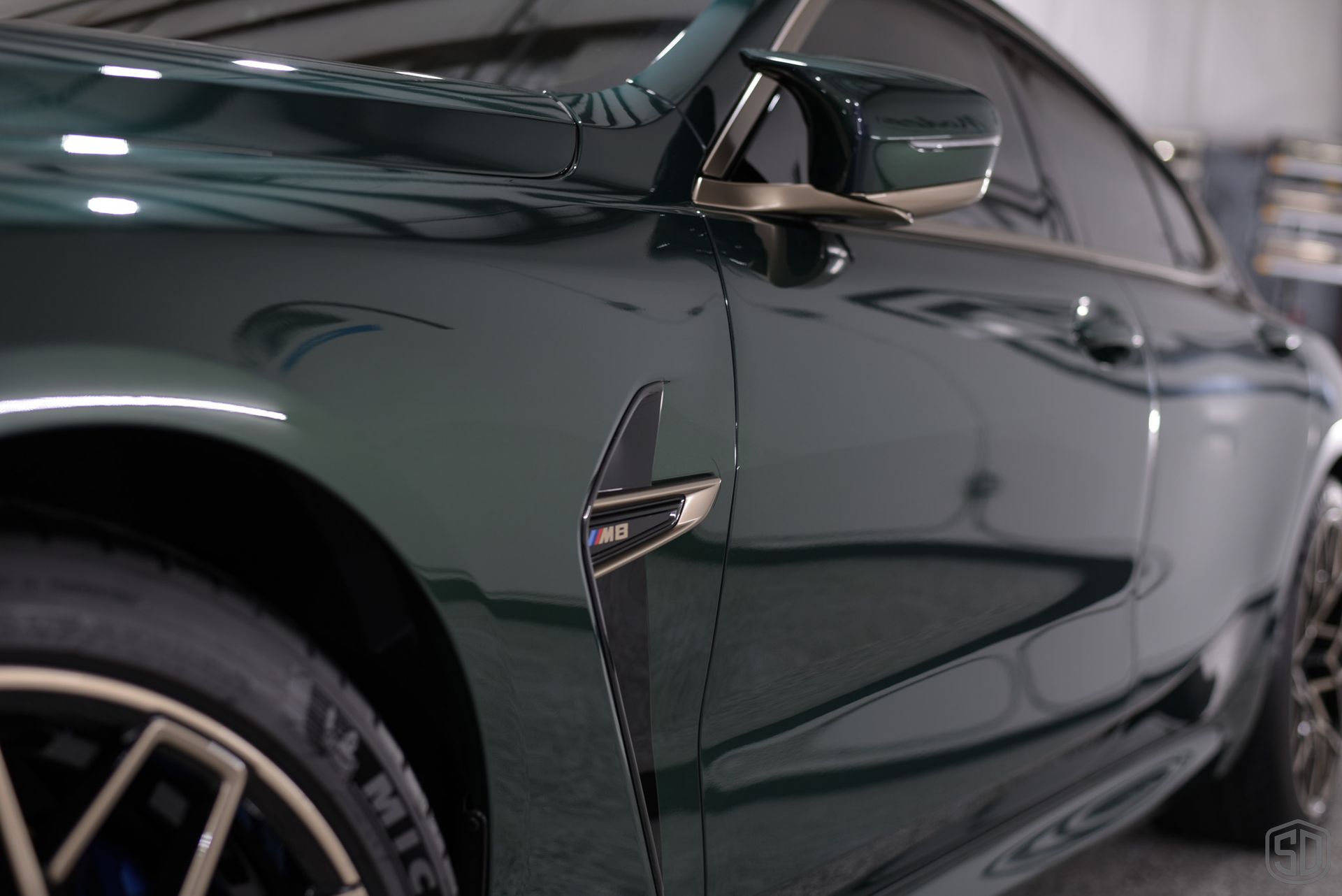 BMW M8 Modesta Coating BC-06 Glass Coating on the Brakes and Calipers side panel emblem Orlando
