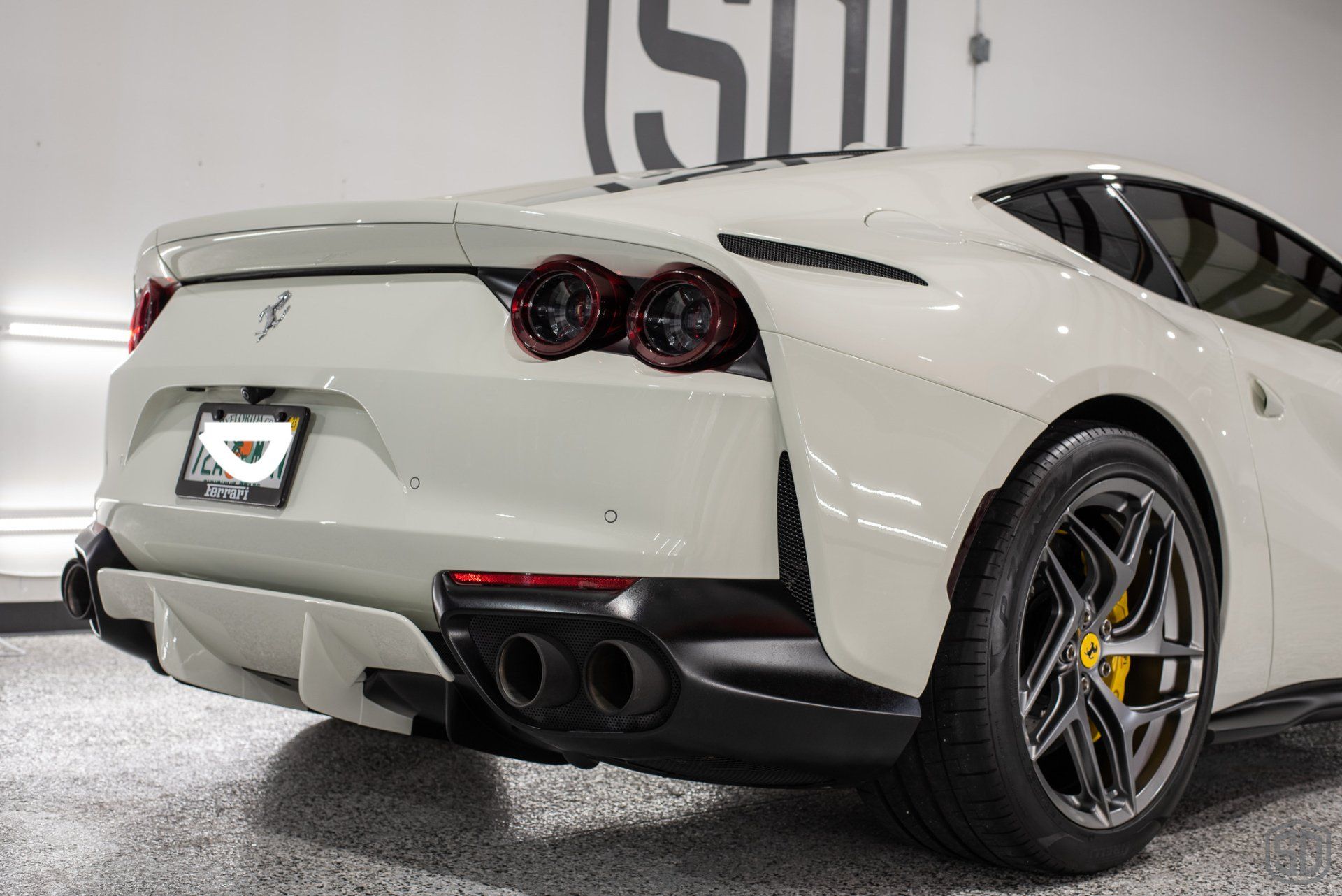 Bianco Avus Ferrari 812 Superfast Detailing, Modesta Primer, Wheel and Caliper Detailing, Interior Conditioning , PPF, Modesta BC-04 Nano-Titanium Glass Coating, and Much More rear view Orlando