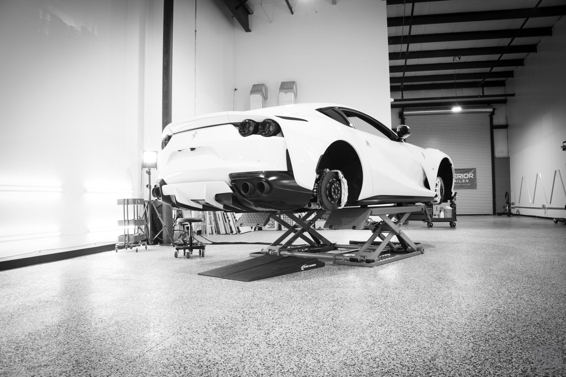Bianco Avus Ferrari 812 Superfast Detailing, Modesta Primer, Wheel and Caliper Detailing, Interior Conditioning , PPF, Modesta BC-04 Nano-Titanium Glass Coating, and Much More all wheels off Orlando FL