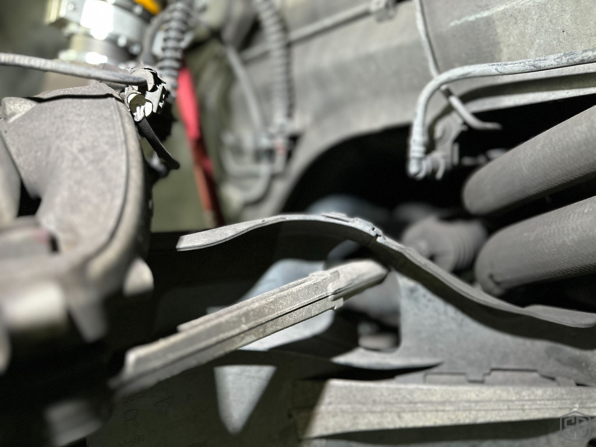 A close up of a brake pedal on a car