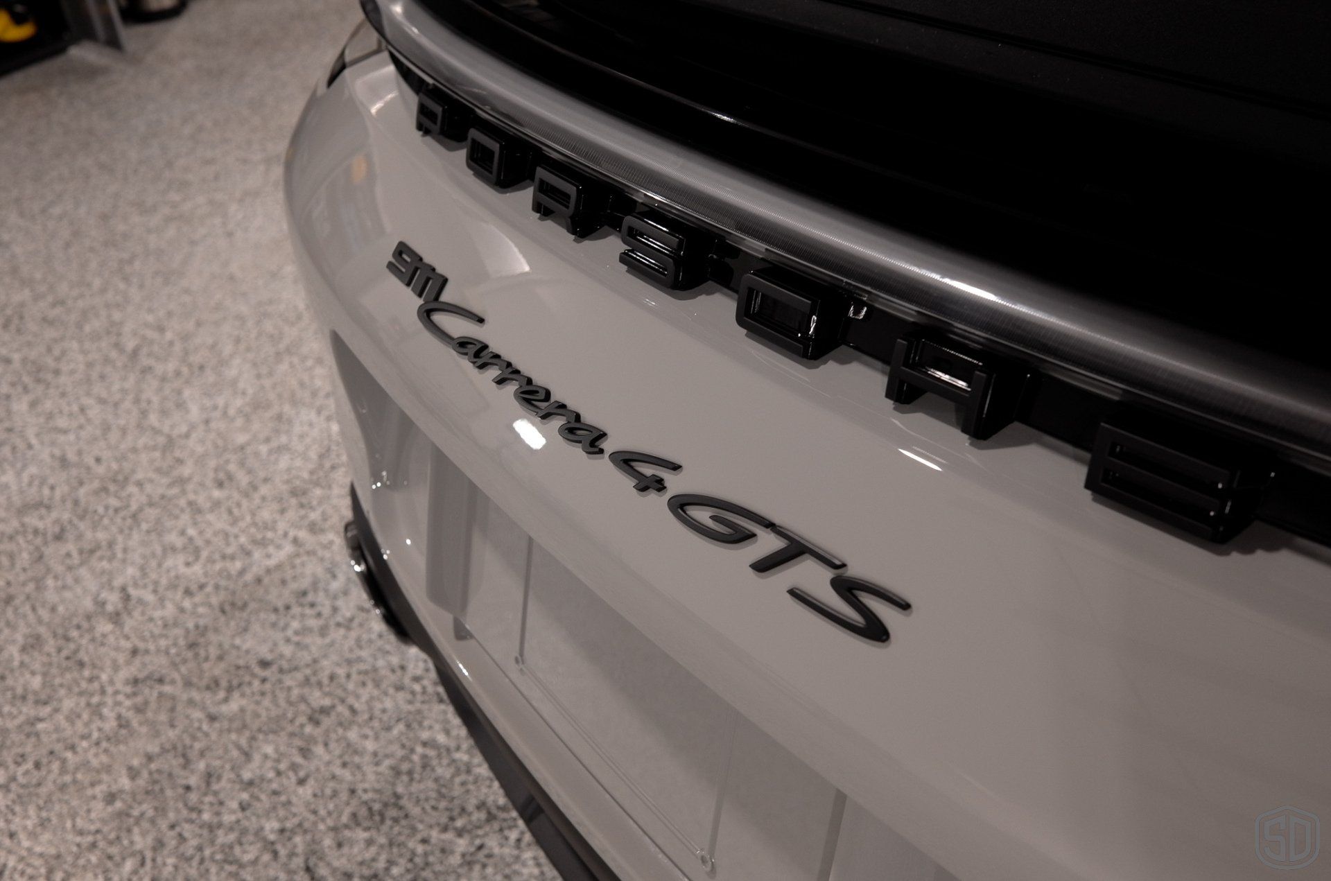 Chalk 911 Carrera 4 GTS Paint Protection Film emblem close up Florida