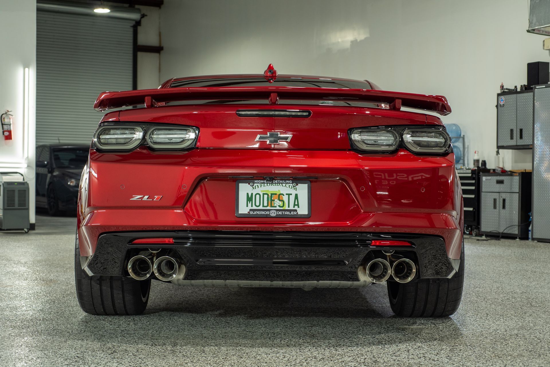 Chevrolet Camaro ZL1 Modesta Ceramic Coating on paint, wheels, and brake calipers and Xpel Paint Protection Film to Front Bumper and Rear Splash rear view Florida USA